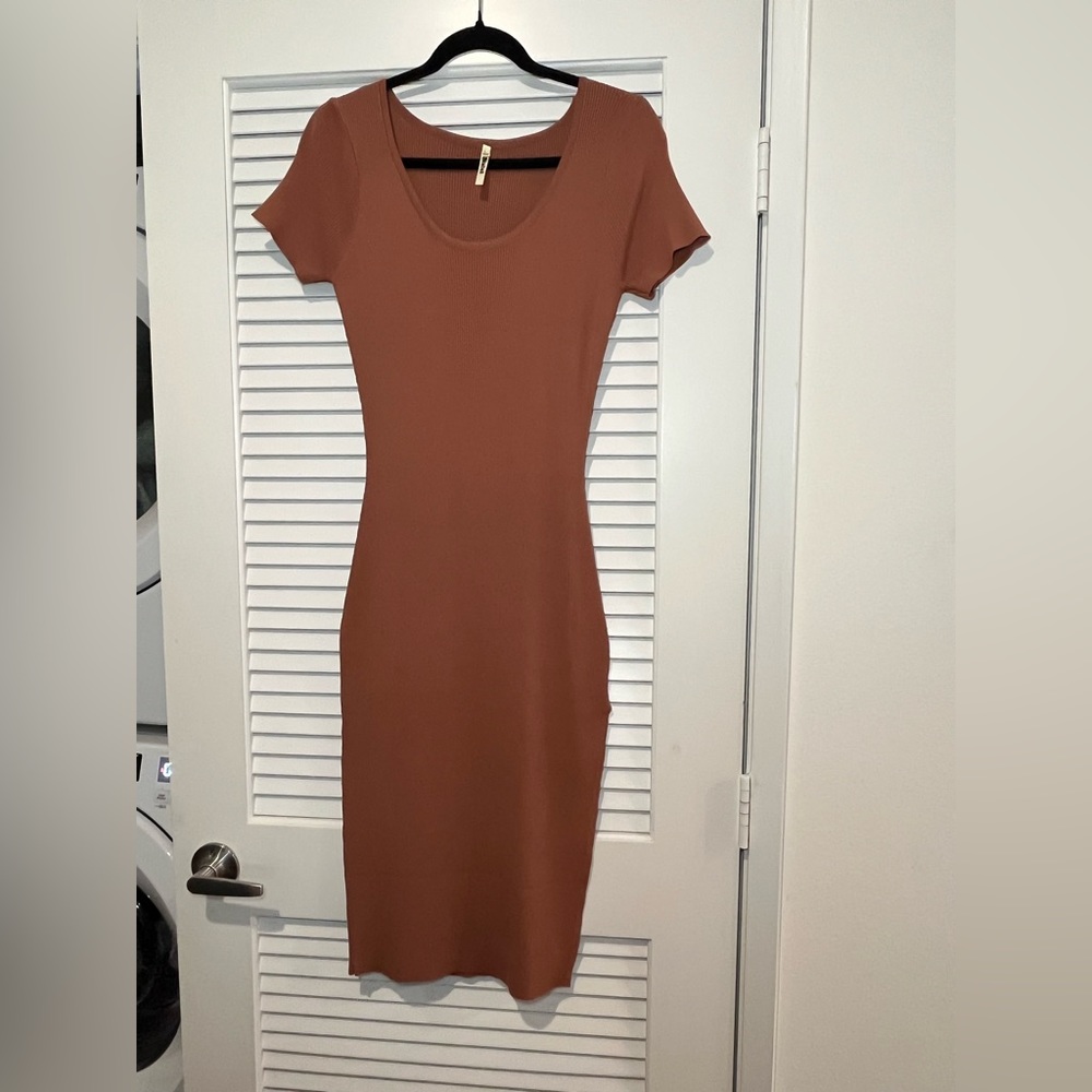 Rust color dress with split hem